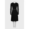 Fitted black dress with long sleeves