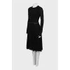 Fitted black dress with long sleeves