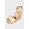 Leather sandals with wooden wedges