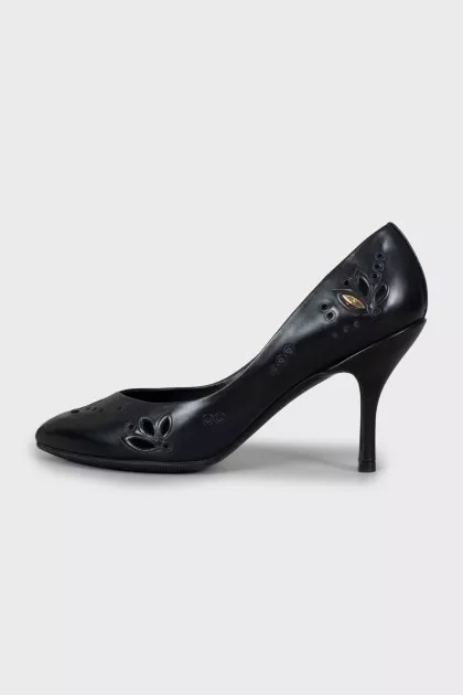 Black leather shoes with perforations