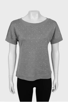 Straight T-shirt decorated with rhinestones