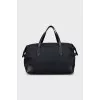 Travel bag in branded print