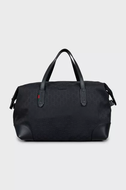 Travel bag in branded print