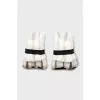 Ruffled cuffs with snap buttons