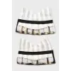 Ruffled cuffs with snap buttons