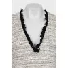 Dress decorated with lace and fringe