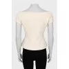 Double breasted off shoulder vest