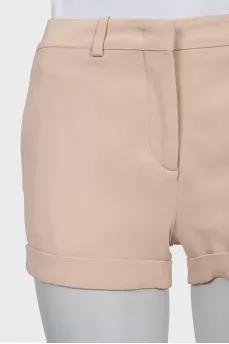 Beige shorts with turn ups
