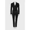 Suit with striped trousers
