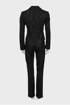 Suit with striped trousers