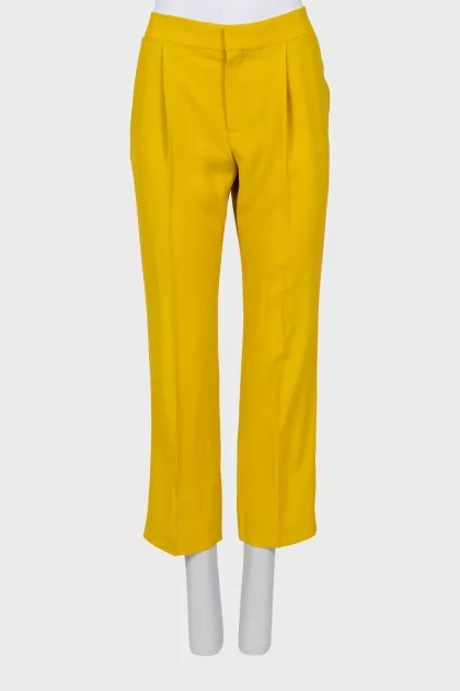 Yellow trousers with arrows