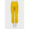 Yellow trousers with arrows
