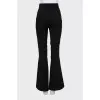 Flared trousers with slits at the bottom