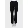 Striped trousers with zipper at the bottom
