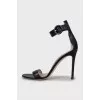 High-heeled leather sandals