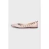 Leather ballet shoes decorated with studs