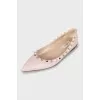 Leather ballet shoes decorated with studs