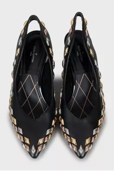 Leather slingbacks decorated with rhinestones