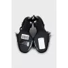 Suede sandals decorated with feathers
