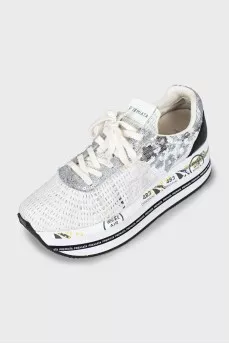 Textile sneakers decorated with sequins