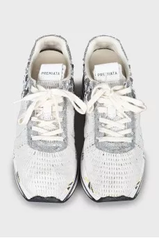 Textile sneakers decorated with sequins