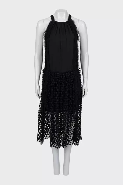 Sleeveless dress decorated with fringe