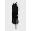 Sleeveless dress decorated with fringe