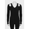 Knitted pullover with leather inserts