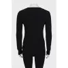 Knitted pullover with leather inserts