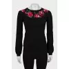 Wool sweater with raised seams