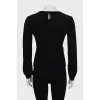 Wool sweater with raised seams