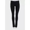 Mid-rise black trousers