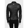 Leather jacket decorated with lace