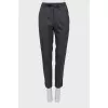 Tapered trousers with velor stripes