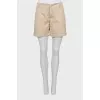 Beige mid-rise shorts