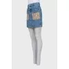 Denim mini skirt with gold hardware