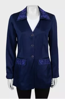 Blue jacket with embroidery on the collar