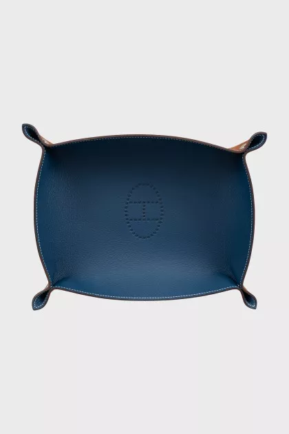 Leather basket with perforations