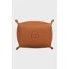 Leather basket with perforations