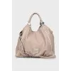 Leather hobo bag with raised seams