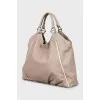Leather hobo bag with raised seams