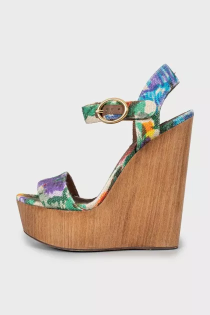 Textile sandals on a wooden wedge