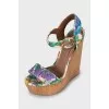 Textile sandals on a wooden wedge