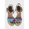 Textile sandals on a wooden wedge