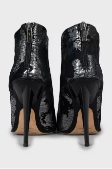 Suede ankle boots with silver print