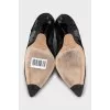 Suede ankle boots with silver print