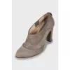 Suede ankle boots with raised seams