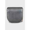 Gray crossbody bag with gold hardware
