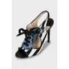 Leather sandals in a combined print