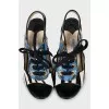 Leather sandals in a combined print